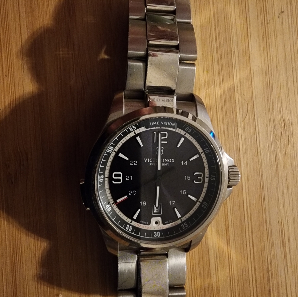 Victorinox Silver and Black Watch with Timeless Design